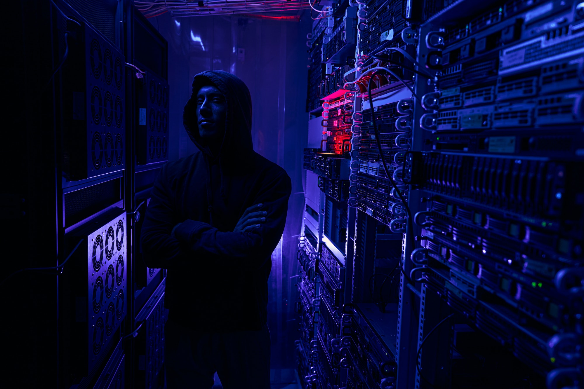 Tranquil data center intruder in dark server room